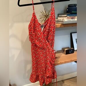 Free People mini wrap dress, new condition with tags.
